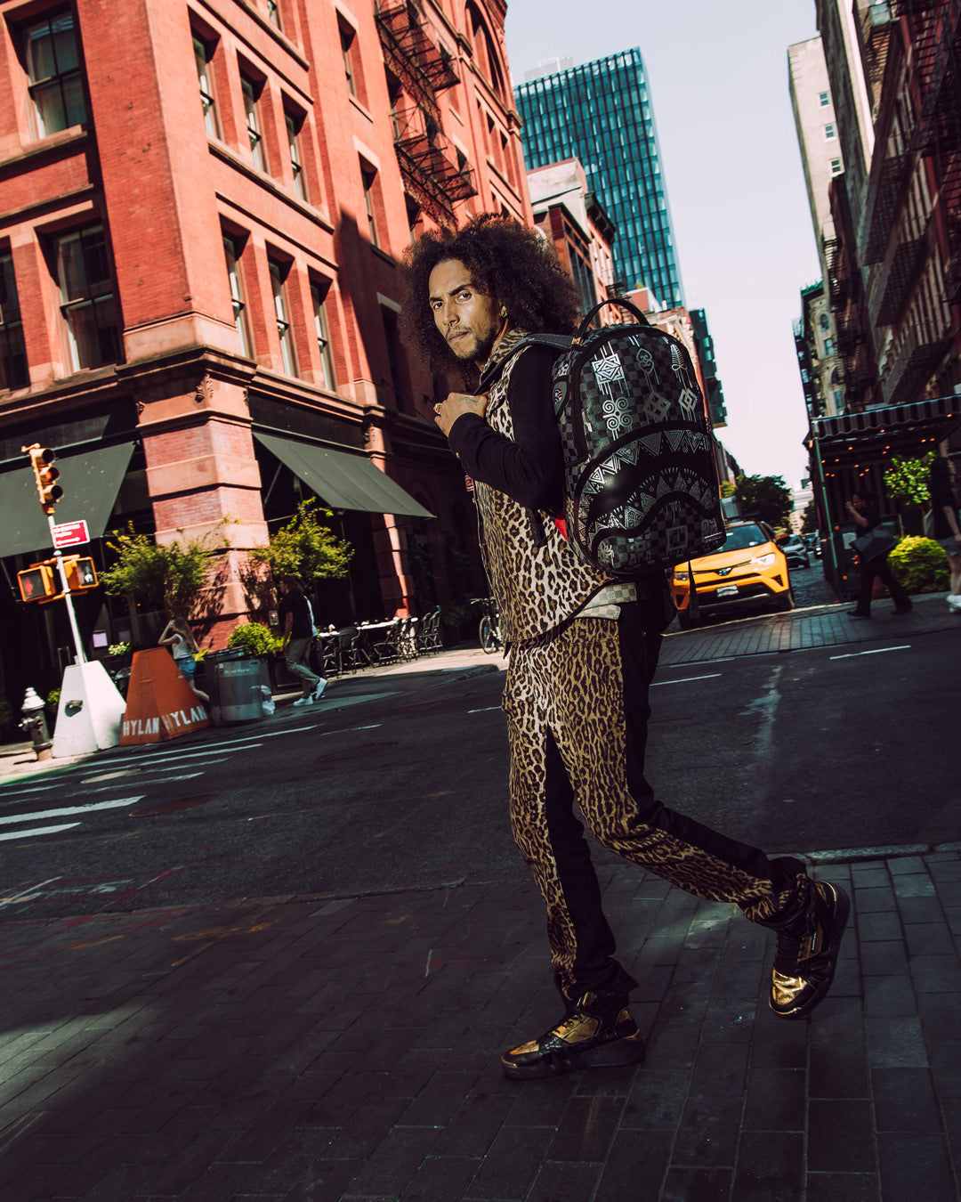 AFRICAN INTELLIGENCE 9 POWER GLYPHICS BACKPACK - SANDFLOWER COLLAB